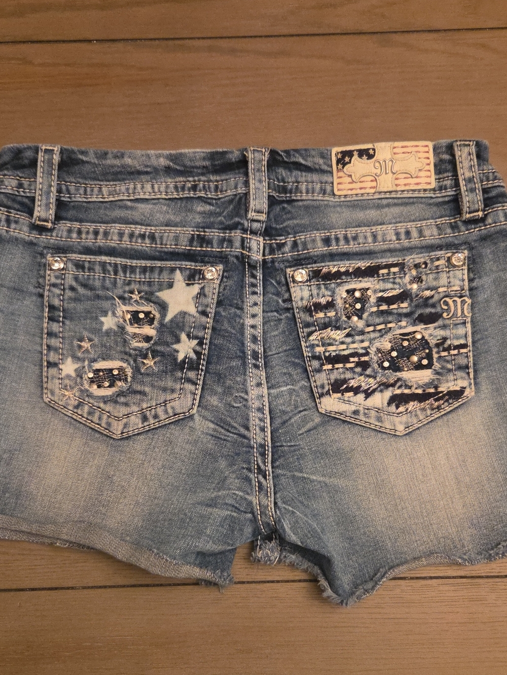 Miss Me Denim Cutoff Shorts with Embellished Star Pockets